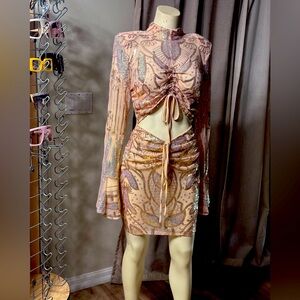 Pink Rose Gold and Silver Mini Dress
Spandex Polyester Sequins 
Size Medium